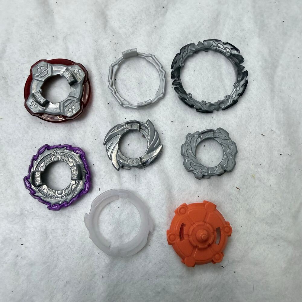 Lot of 8 Beyblade Burst Forge Discs & Related Parts Metal Plastic Hasbro Tomy